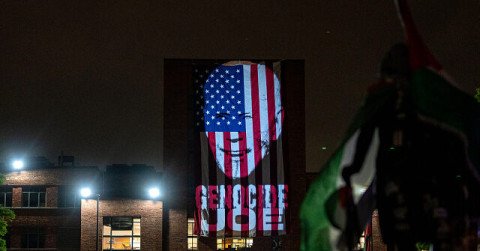 Anti-Israel Protesters at George Washington University Project ‘Genocide Joe’ over American Flag