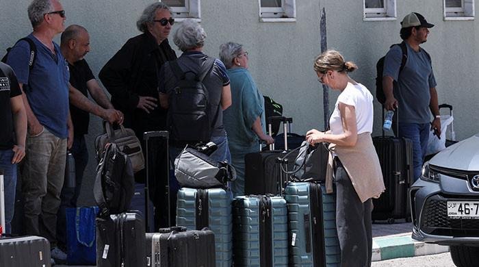 Thousands being evacuated from Israel and Iran as war rages on
